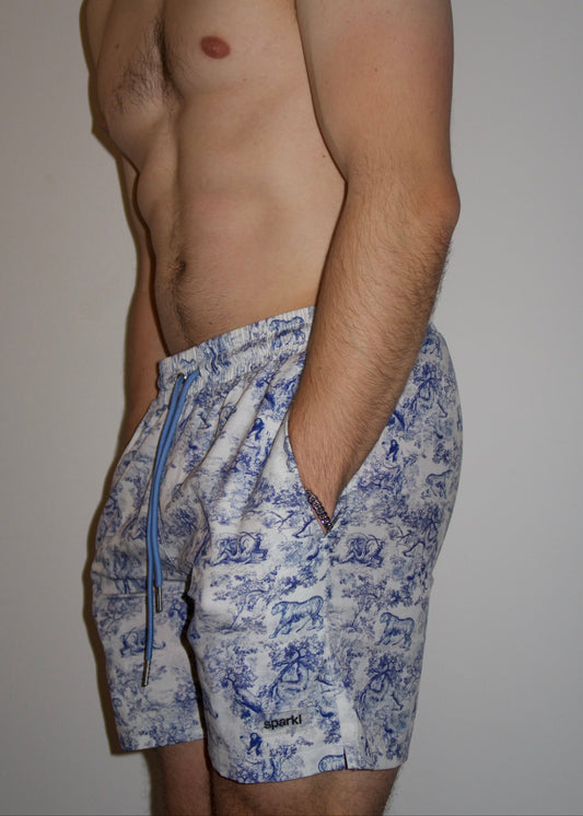 Male wearing high quality, lined, 5 inch inseam luxury mens swim shorts 